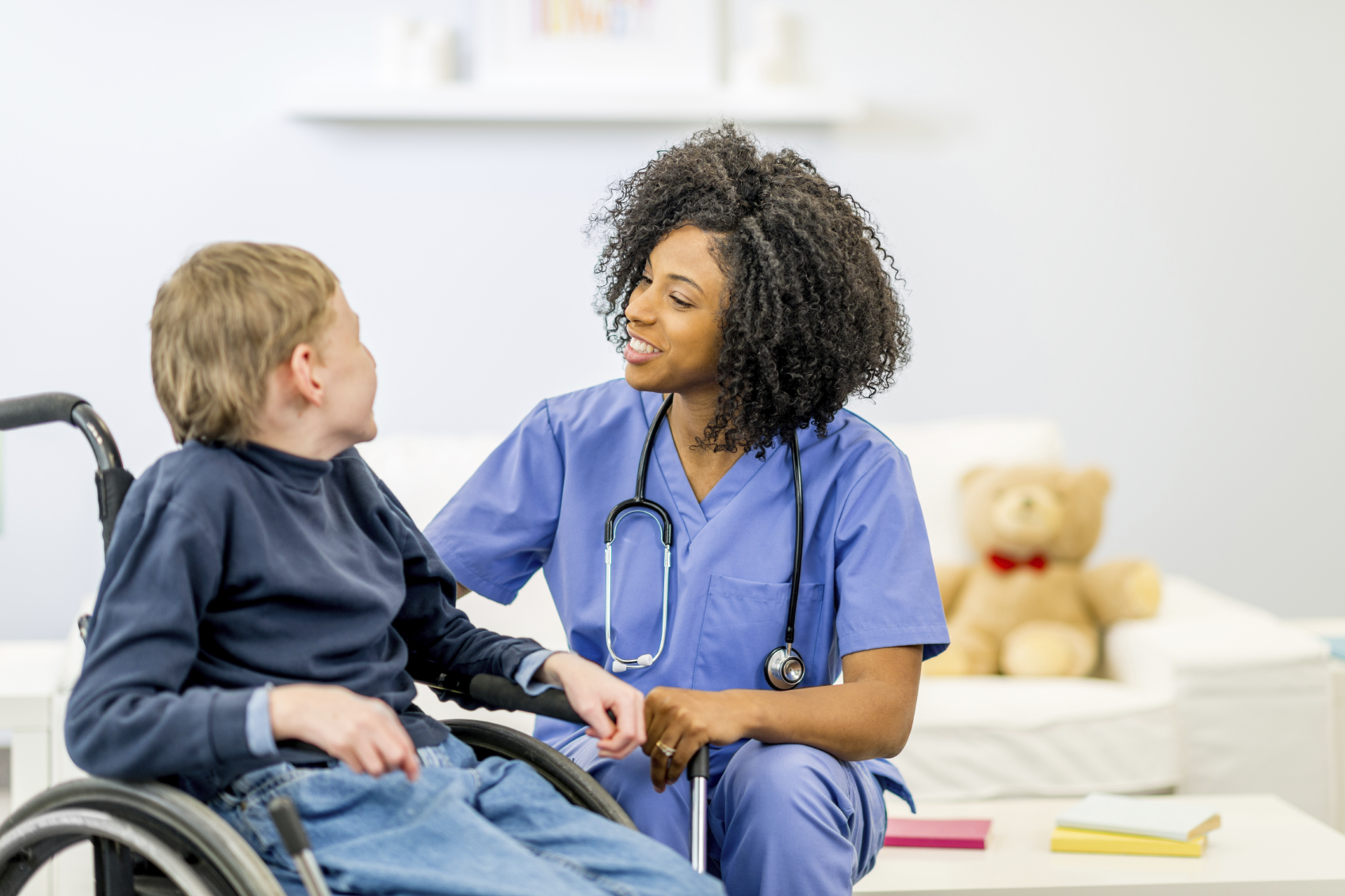 A child with special needs due to chromosome 8P inversion duplication syndrome with a doctor.